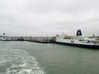 Two P&O Ferries berthed in Calais on a grey day