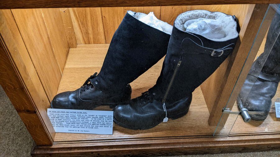Fur-lined black flying boots with detachable tops