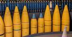 A row of yellow 15" naval shells