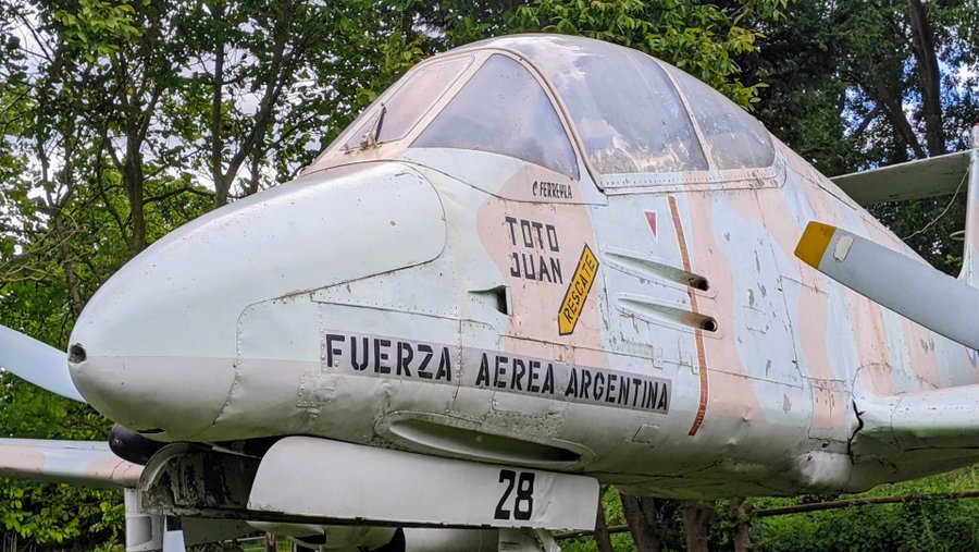 Close up photo of the nose & cockpit of a Pucara ground attack aircraft