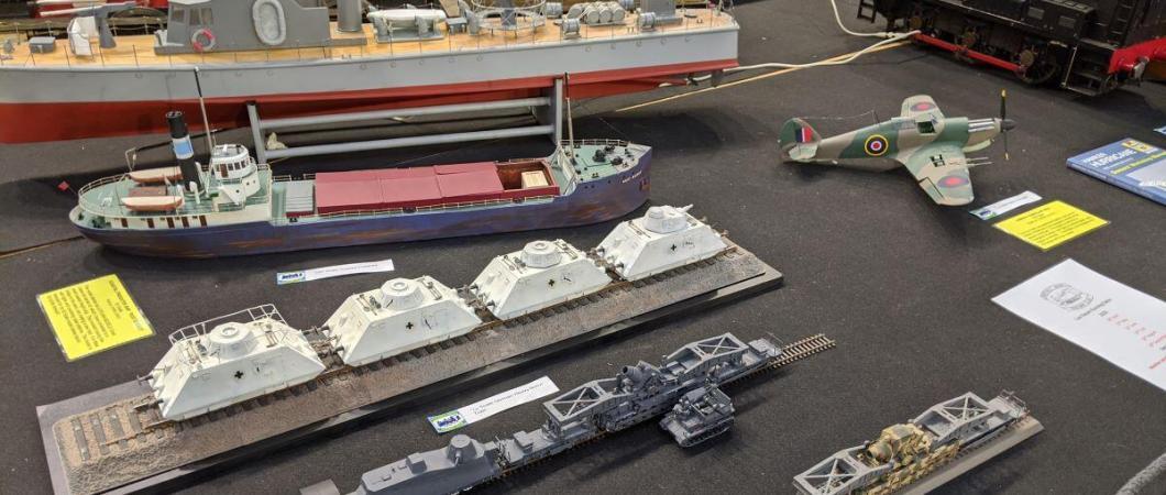 Model ships, aeroplanes and trains on a table top