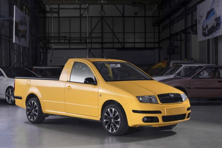 A bright yellow Škoda pickup