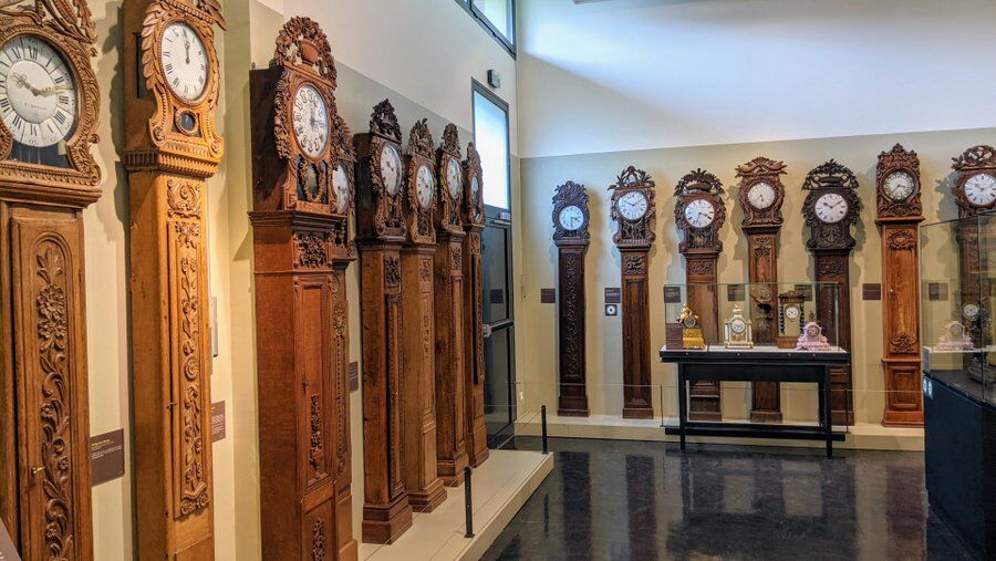 A row of tall St. Nicolas clocks