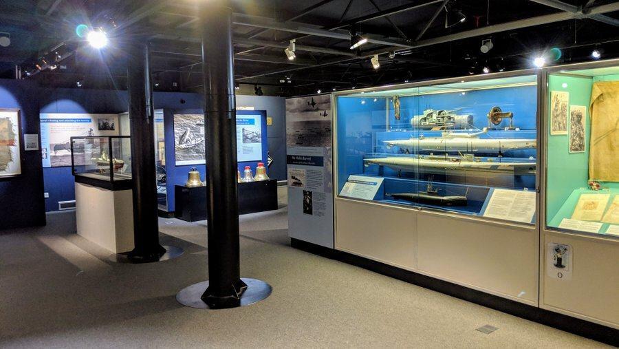 Gallery with model submarines in display case