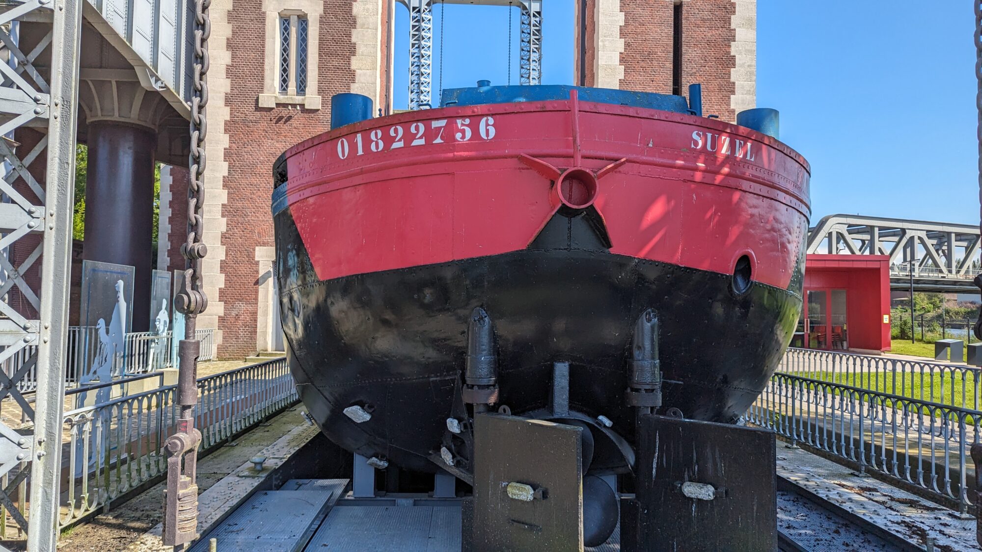 Red-painted stern of the barge Suzel