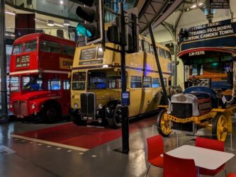 Three double-decker buses in a row