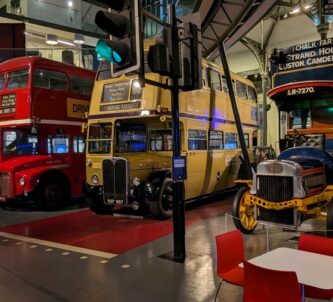 Three double-decker buses in a row