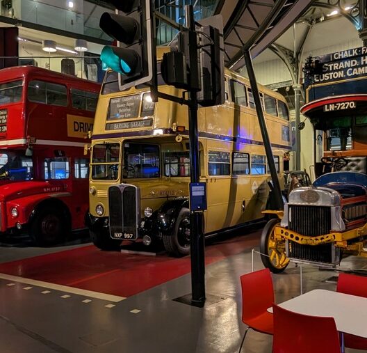 Three double-decker buses in a row