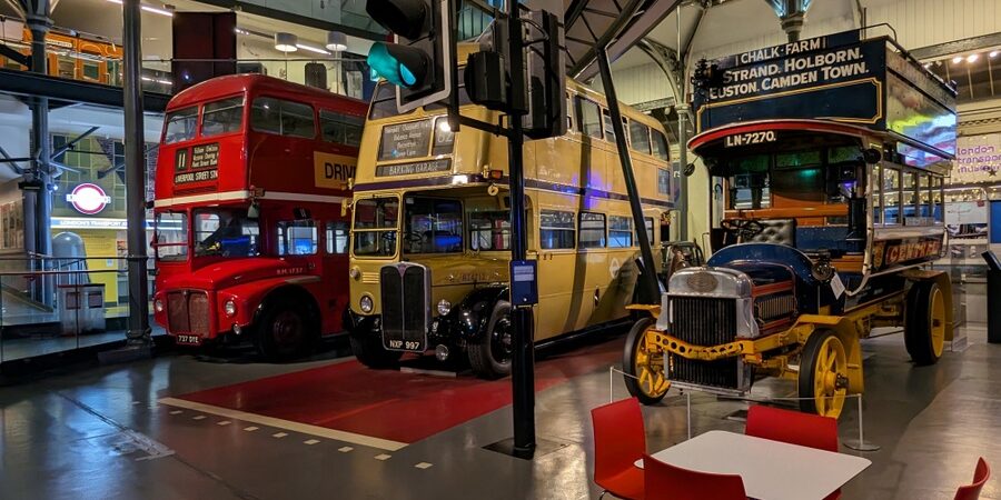 Three double-decker buses in a row