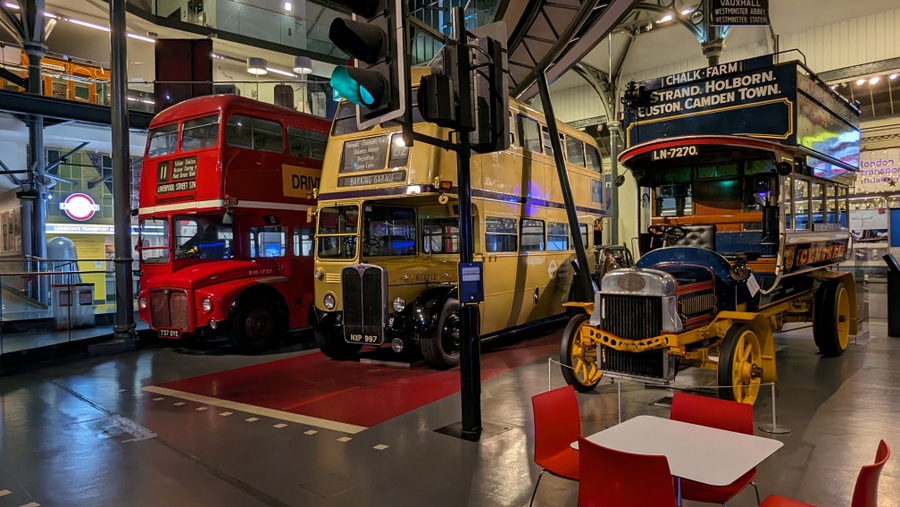 Three double-decker buses in a row