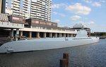 Grey submarine in a dock