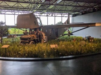 WW2 American glider unloading a jeep in a D-Day landing diorama