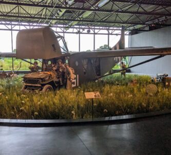 WW2 American glider unloading a jeep in a D-Day landing diorama
