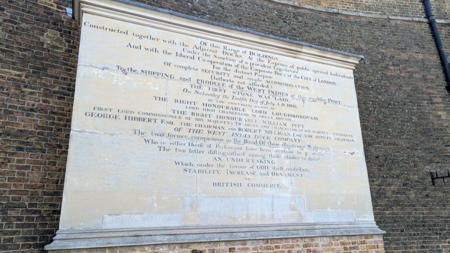 Large white stone plaque on the West India Dock wall