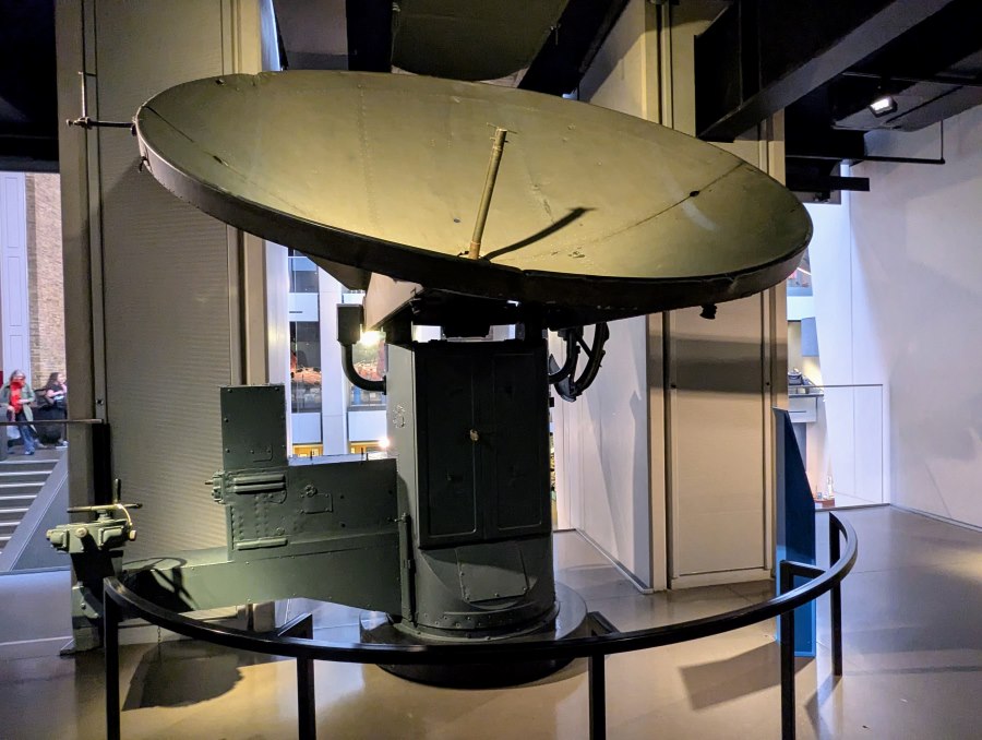 A green painted radar dish