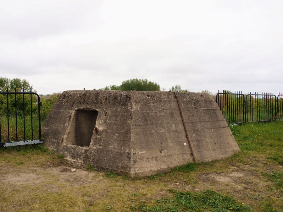 Square concrete base with sloping sides