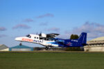 Twin engine Dornier regional passenger aircraft in ZeroAvia livery takes to the air