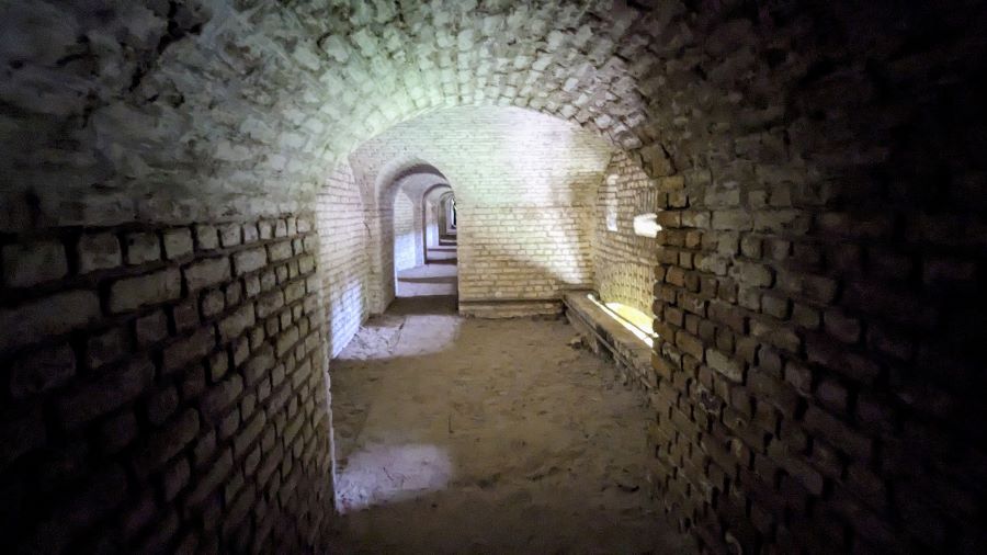 Brick gallery illuminated by sunlight