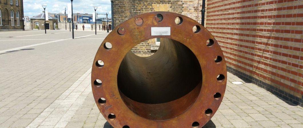A large steel tube, slightly rusty