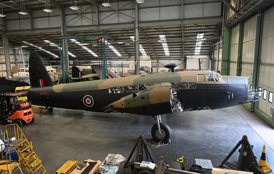 Restored Wellington bomber in green/brown camouflage in the Conservation hanger at the RAF Museum, Cosford